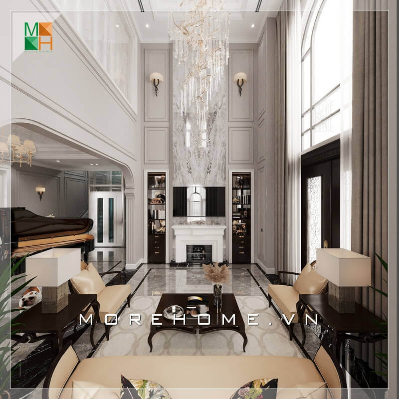 Không gian phòng khách tráng lệ, với mẫu bàn ghế sofa phòng khách sử dụng chất liệu bàn là gỗ tự nhiên cao cấp, ghế sofa bọc da chân ghế sang trọng. Tất cả tạo nên một không gian phòng khách rất hoành tráng và đẳng cấp. Mẫu nội thất biệt thự đẹp