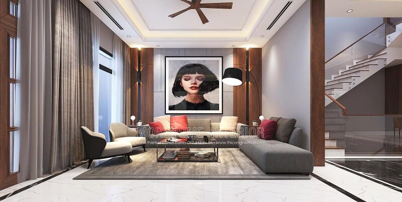 Bố trí nội thất phòng khách ấn tượng với phong cách hiện đại cùng cách trang trí sáng tạo từ điểm nhấn tranh treo tường nghệ thuật. Thiết kế phòng khách nhà phố